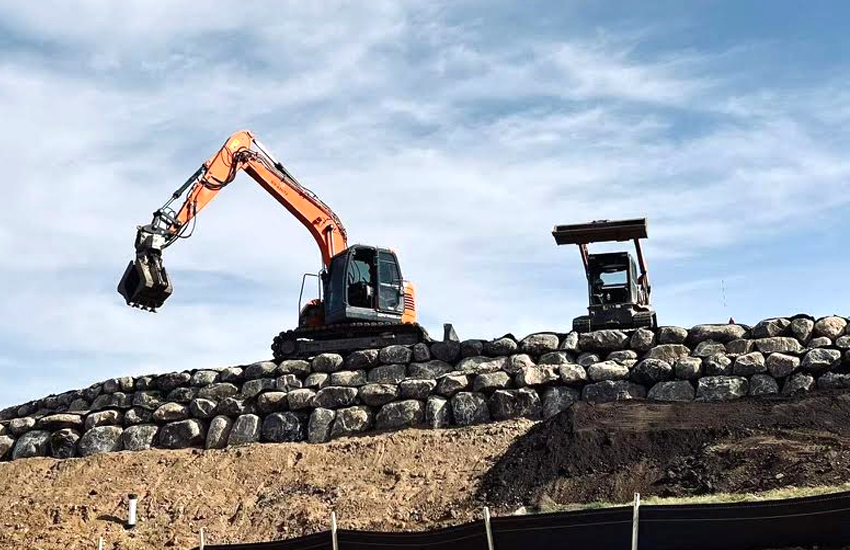 Boulder retaining wall