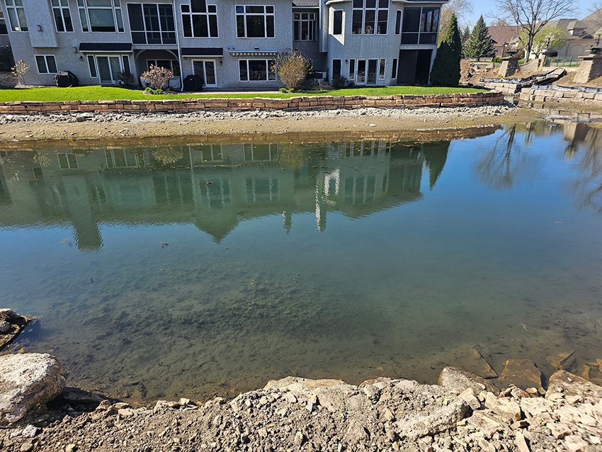 Residential neighborhood lake wall before replacement 01 | Granite Companies MN