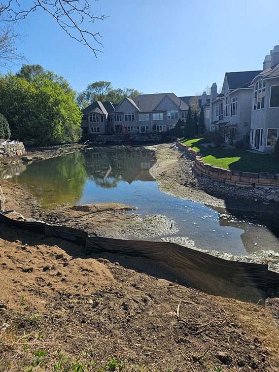Residential neighborhood lake wall before replacement 02 | Granite Companies MN