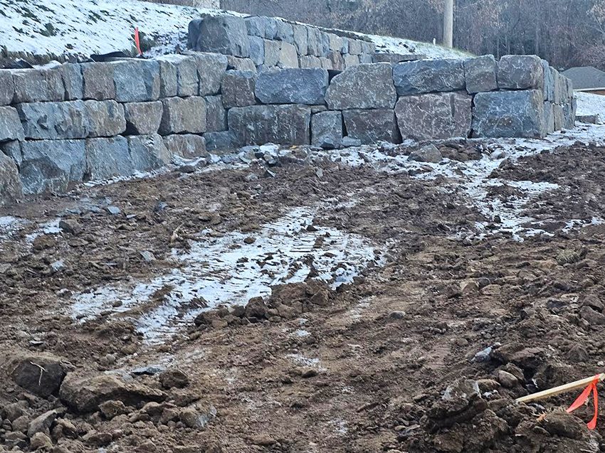 Residential Granite Boulder Retaining Wall Under Constructio | Granite Companies MN