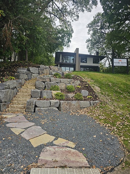 Residential Granite Boulder Retaining Wall With Stone Steps | Granite Companies MN