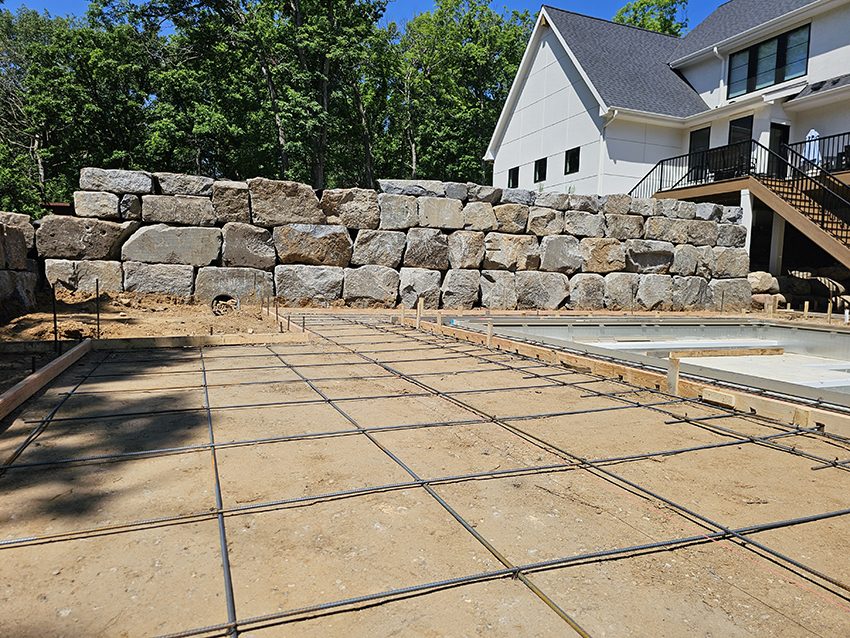 Residential Paver Patio Along A Granite Boulder Retaining Wa | Granite Companies MN