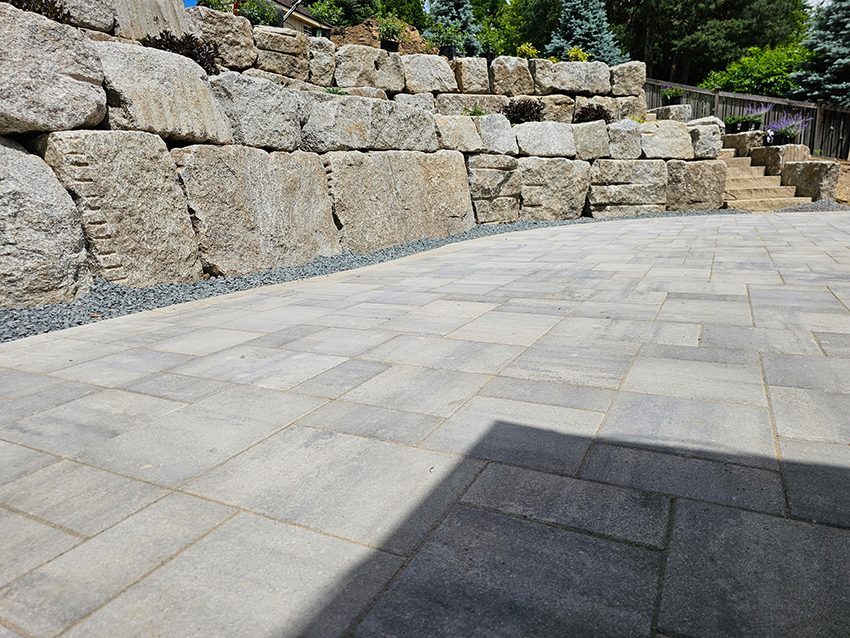 Residential Paver Patio Below A Granite Retaining Wall | Granite Companies MN