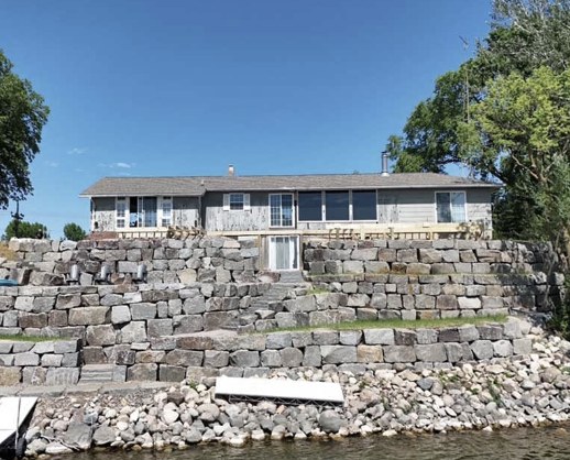 Shoreline after granite boulder restoration | Granite Companies MN
