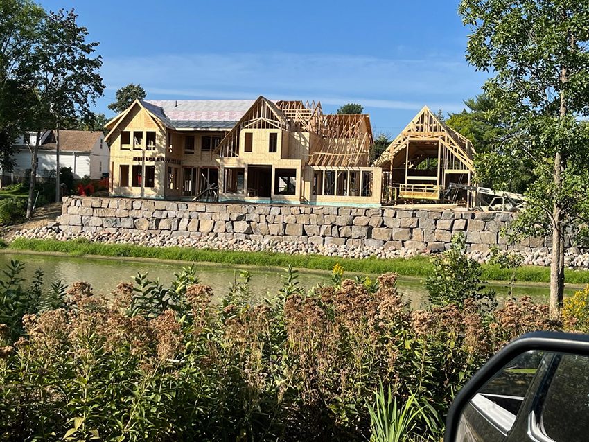 Shoreline Residential Granite Boulder Retaining Wall With Riprap Base  | Granite Companies MN