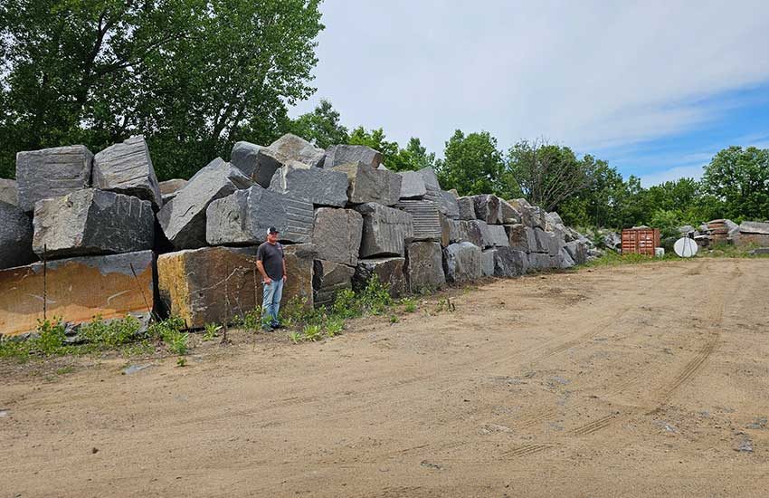 Granite Companies granite boulder pile at quarry MN